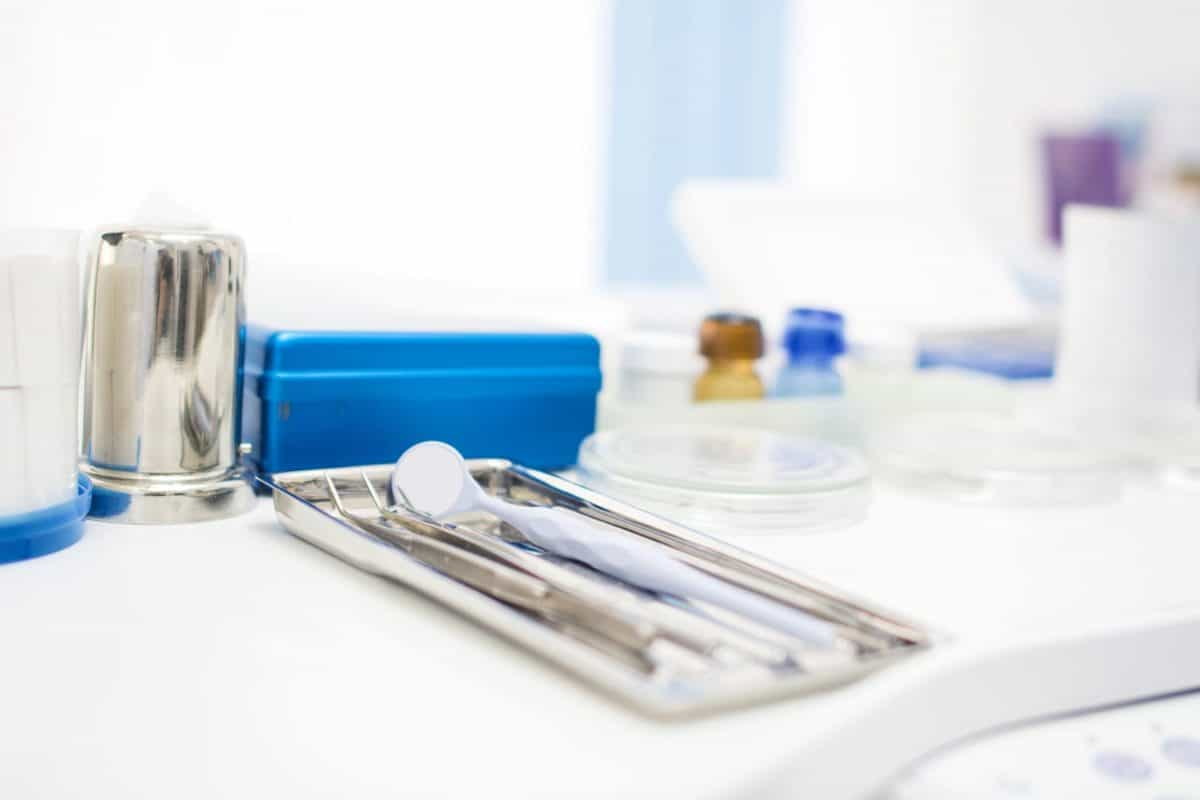 Dental instruments on a clean clinical tray