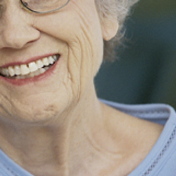 Smiling grandmother representing anti-aging and revitalization support