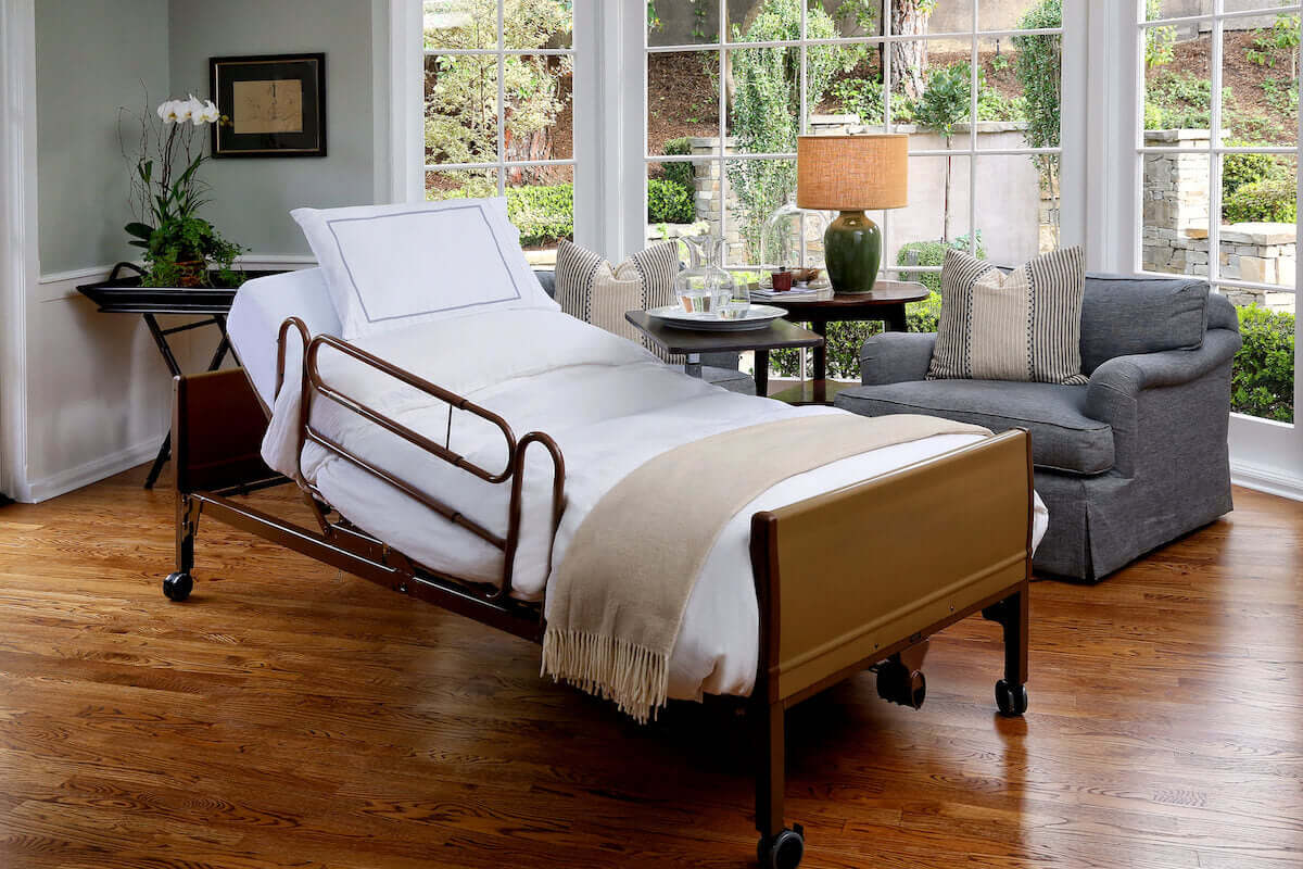 Hospital bed arranged in a comfortable home room